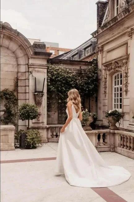 Designer Long A-Line V-neck Simple Satin Sleeveless Wedding Dress With Slit - Image 2