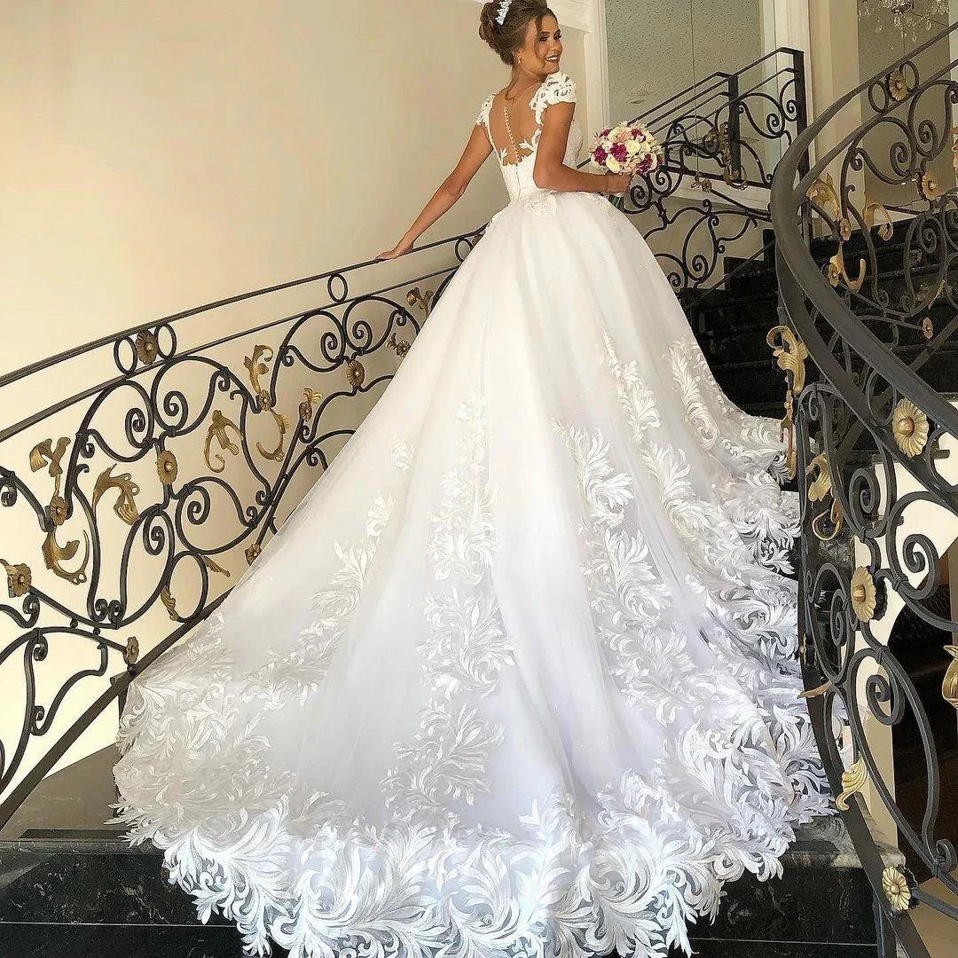 Elegant Long Princess Tulle Lace Wedding Dress with Cap Sleeves - Image 2