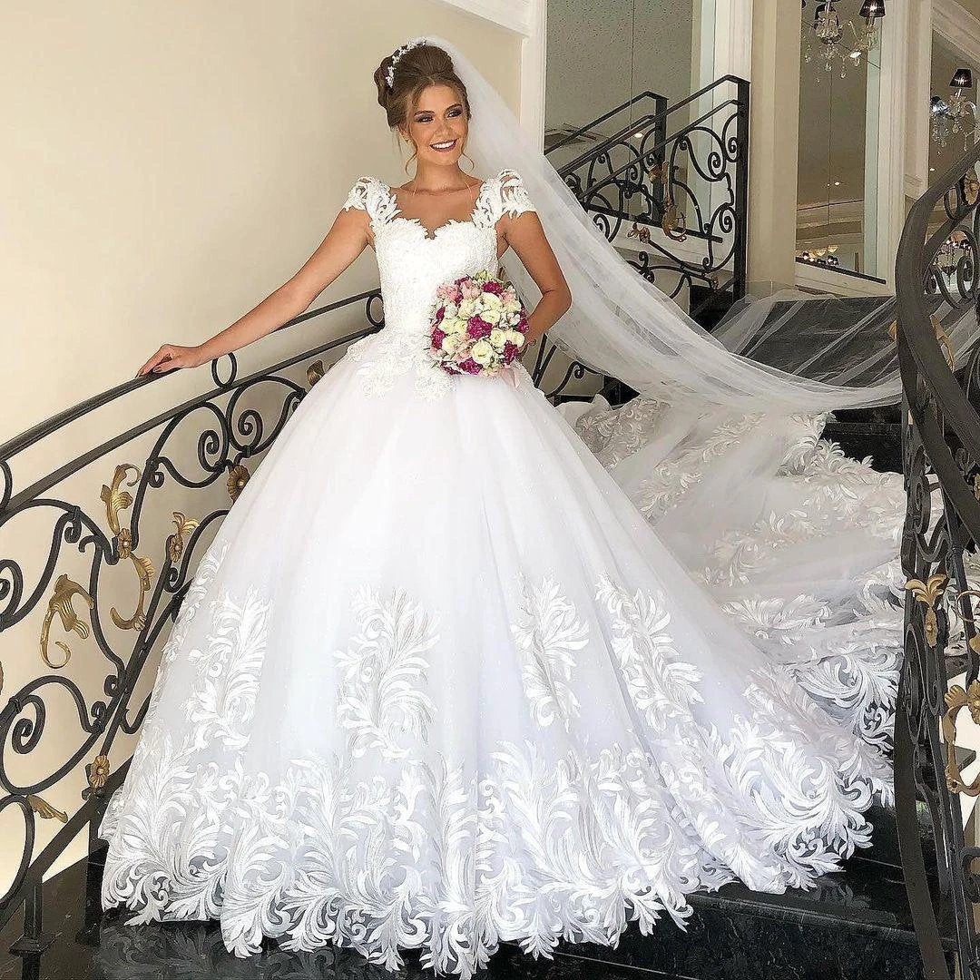 Elegant Long Princess Tulle Lace Wedding Dress with Cap Sleeves - Image 3
