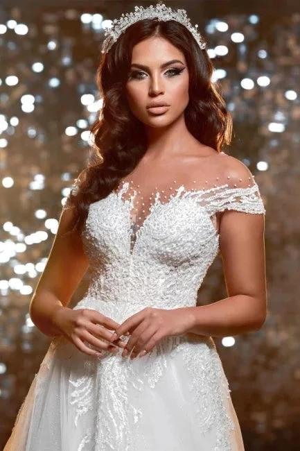 Elegant off-the-shoulder jewel cap sleeves a-line lace Wedding dress - Image 2