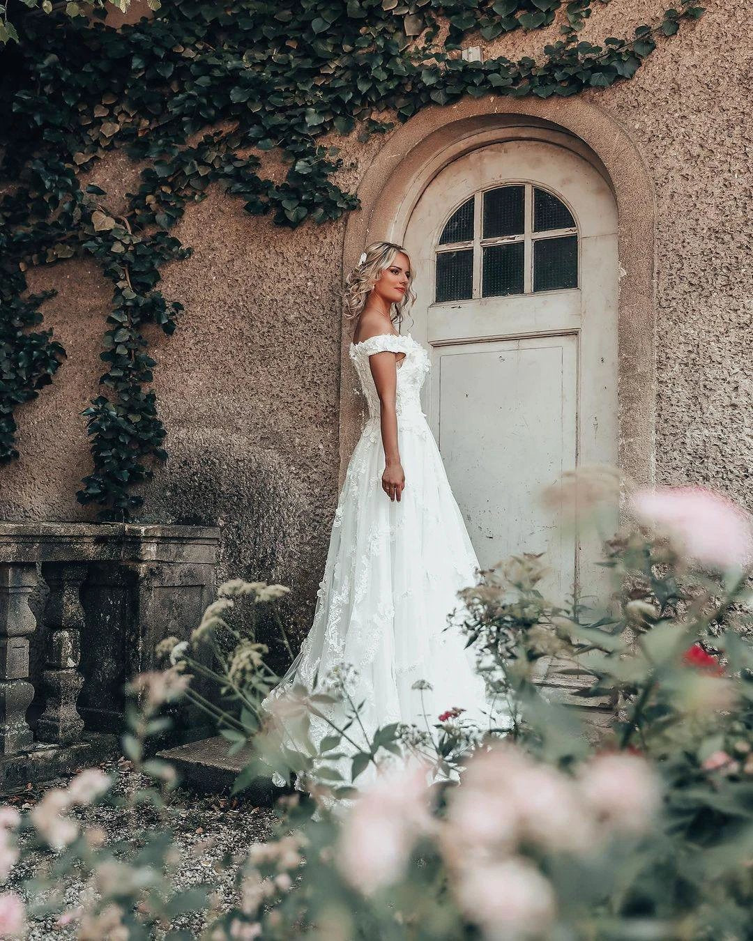 Long A-line Off-the-shoulder 3D Flroal Wedding Dress with Lace Appliques - Image 3
