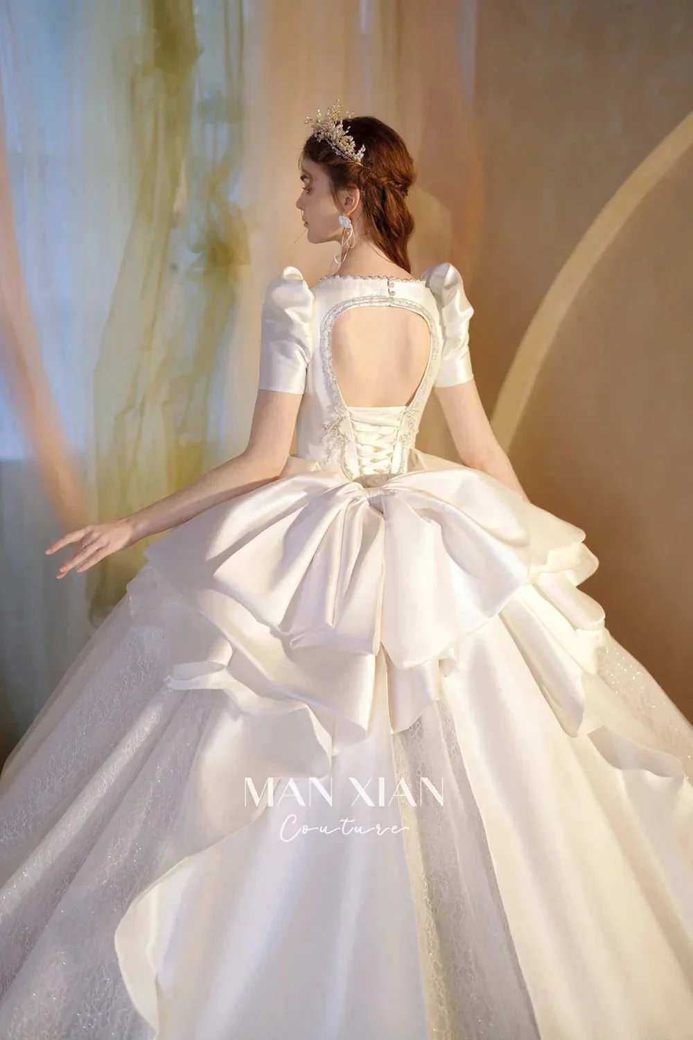 Regal Ivory Square-Neck Satin Ball Gown with Puff Sleeves, Pearl Embroidery & Oversized Bow Train m011 - Image 10
