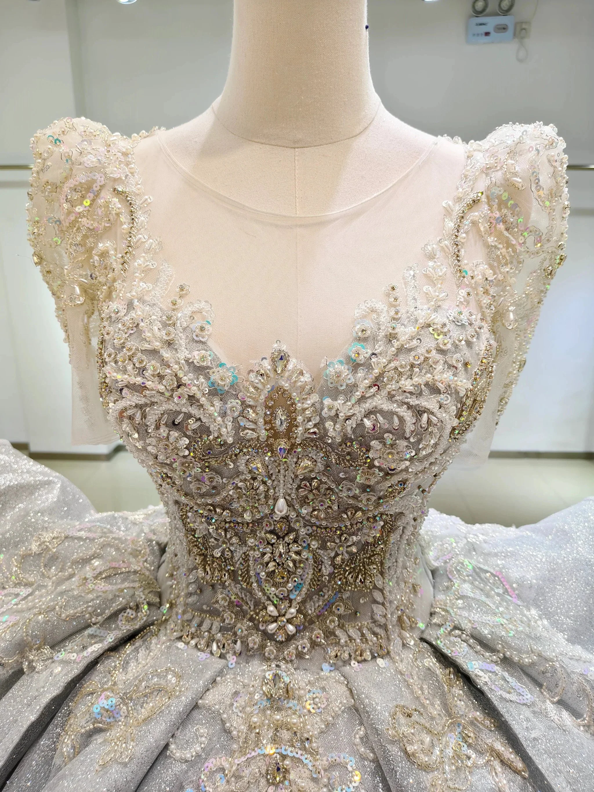 Silver Glimmer V-Neck Ballgown: Crystal-Embroidered Bust & Dramatic Bow Train - Image 2