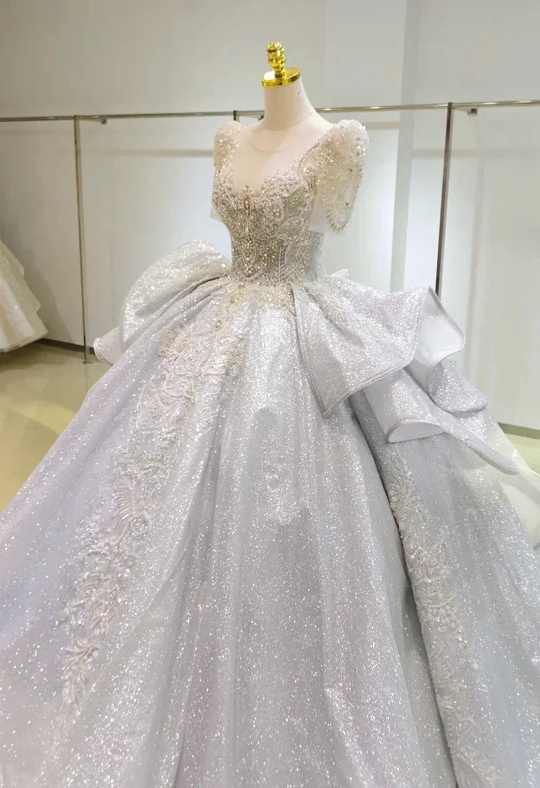 Silver Glimmer V-Neck Ballgown: Crystal-Embroidered Bust & Dramatic Bow Train - Image 3