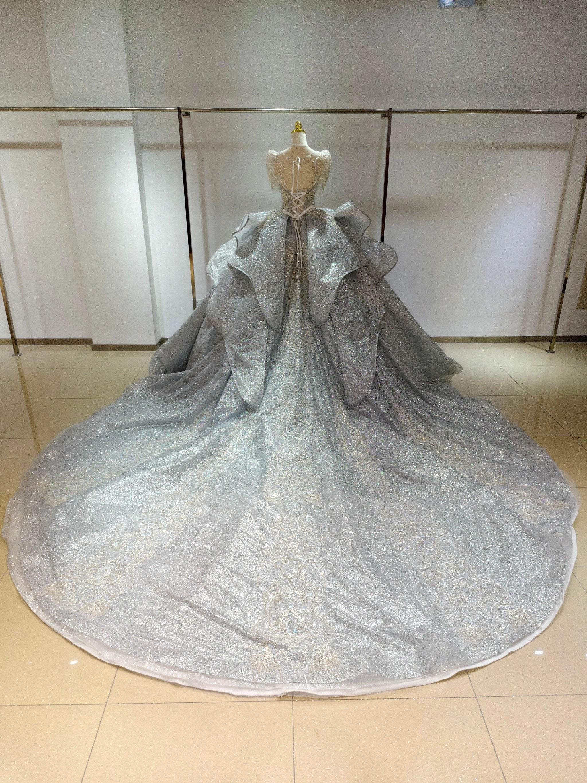 Silver Glimmer V-Neck Ballgown: Crystal-Embroidered Bust & Dramatic Bow Train - Image 5