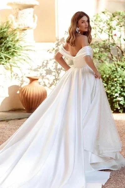 White A-line Sequined Off-the-shoulder Wedding Dress With Ruffles - Image 2